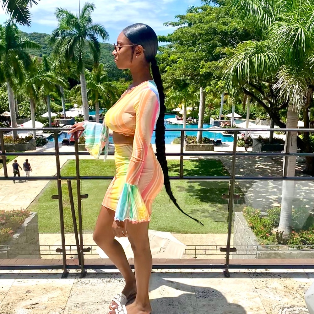 XS-S pink, green, white, yellow and blue two piece set. Versatile wear.